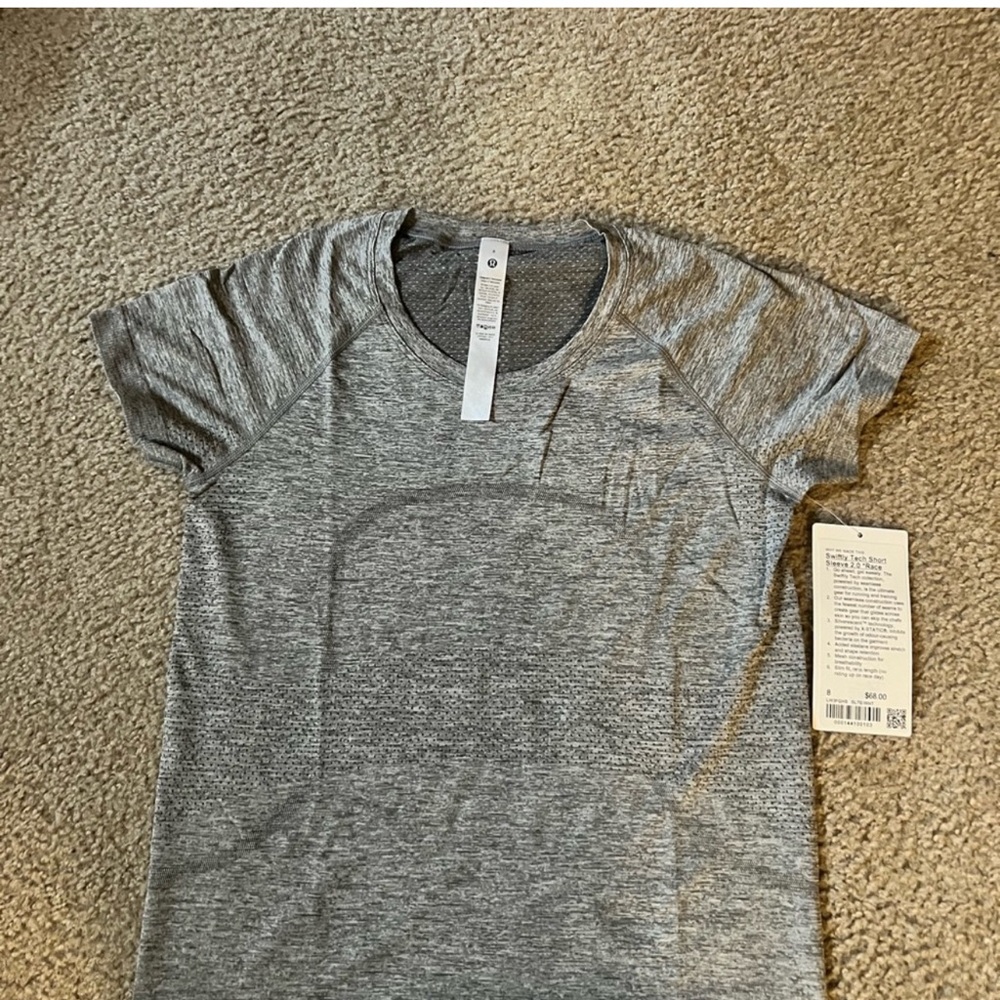 Brand new with tags Lululemom Swiftly tech tee in race length. Size 8